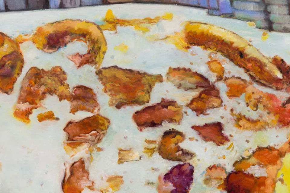 Detail of a painted pale surface with uneven orange and brown patches and thick brushwork.
